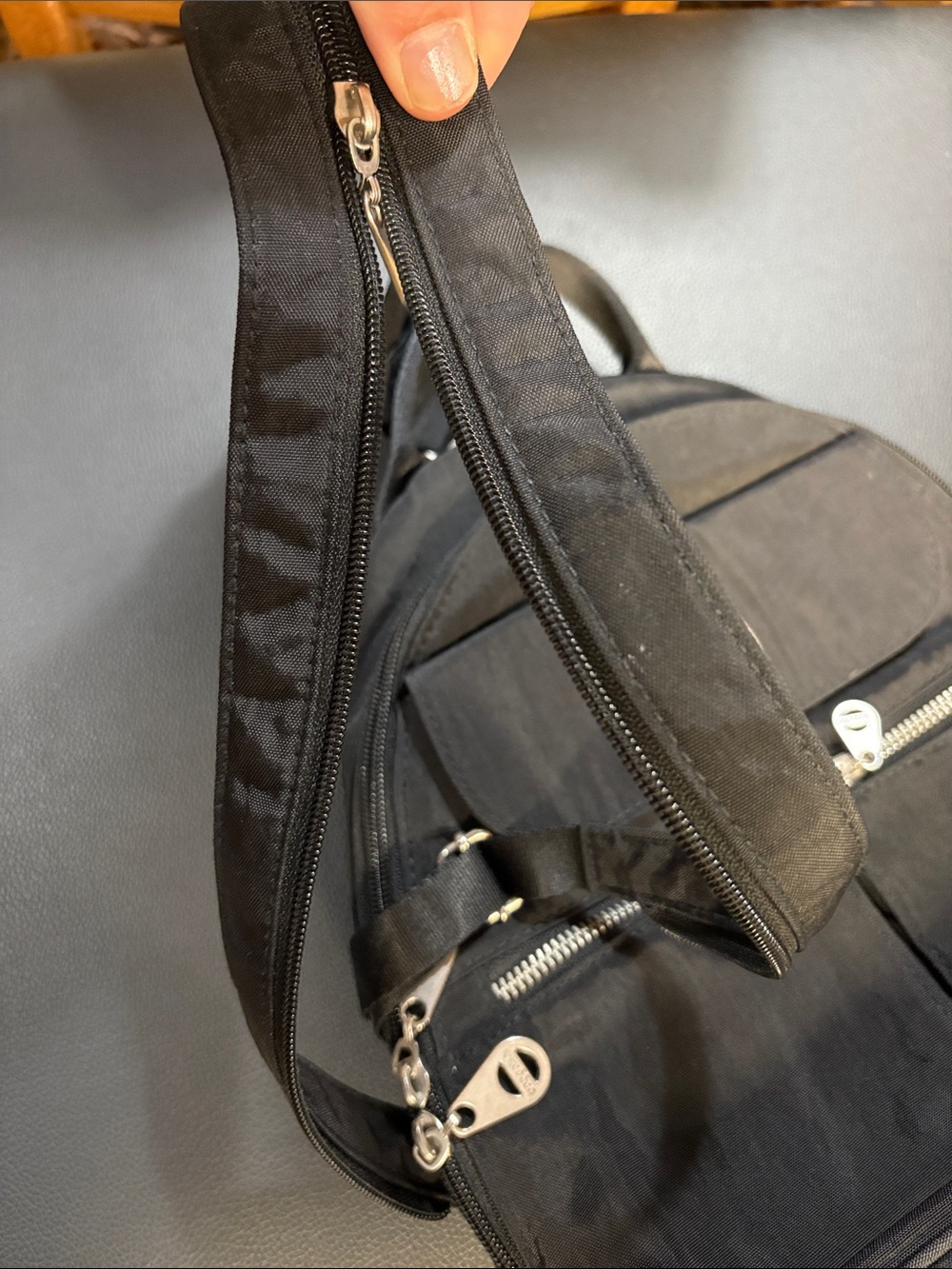 Baggallini Black Compact Crossbody Sling Backpack - Picture 3 of 5